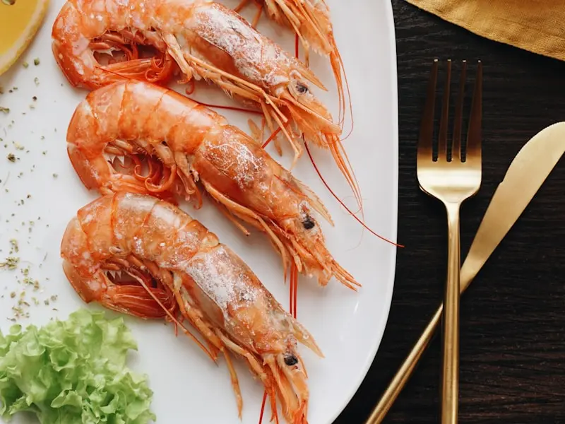 Broiled lobster tail with drawn butter and elegant sides