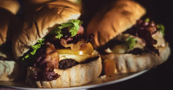 Burger with donair sauce and bacon